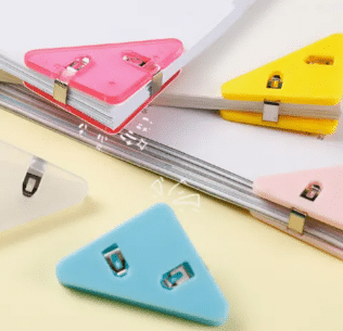 Triangle book clips – prevent books from curling