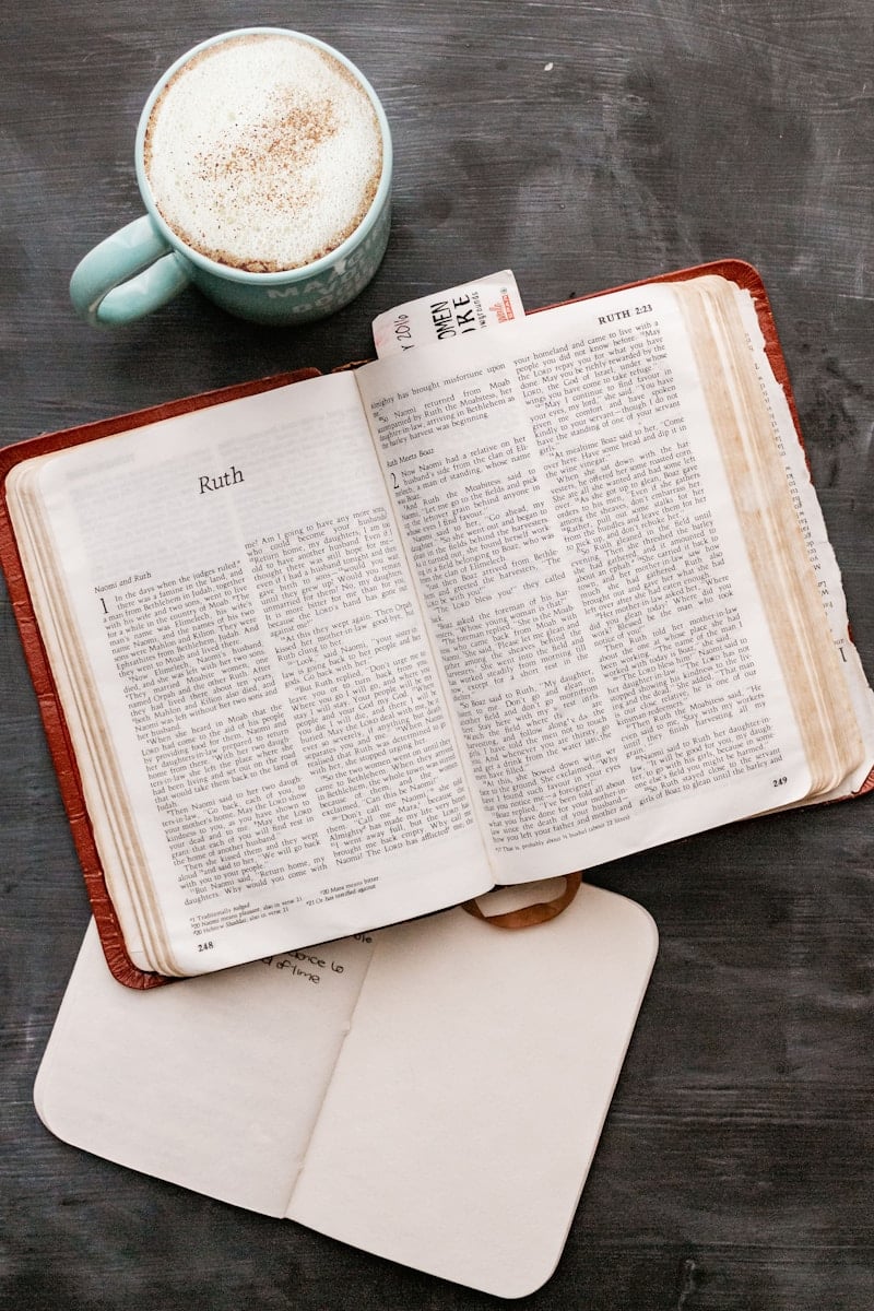 white book page on black wooden table